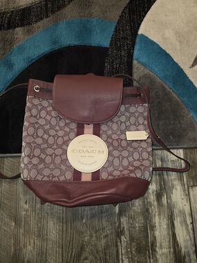 coach elle backpack bag Disney X With Dalmatian Floral Print Brown And White Tones Offer A Sophisticated Look Coach | Bags | Coach